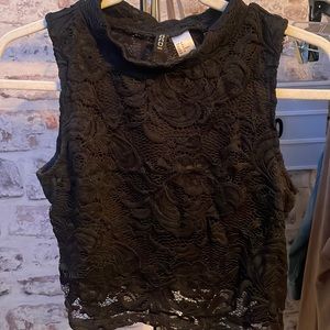 Black Lace sleeveless shirt.